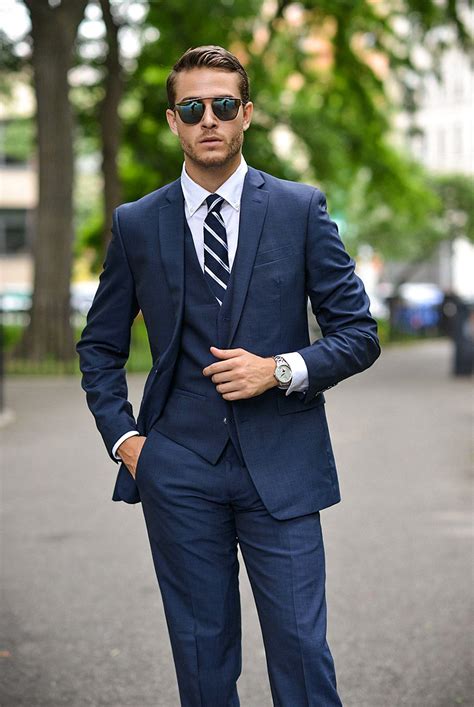 blue tie with navy suit.